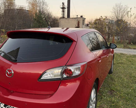 Красный Мазда 3, объемом двигателя 1.6 л и пробегом 51 тыс. км за 9800 $, фото 4 на Automoto.ua