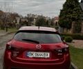 Красный Мазда 3, объемом двигателя 1.5 л и пробегом 96 тыс. км за 11300 $, фото 1 на Automoto.ua