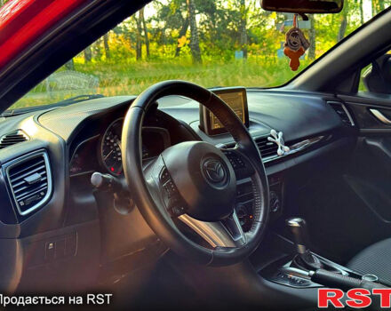 Красный Мазда 3, объемом двигателя 2 л и пробегом 143 тыс. км за 9350 $, фото 5 на Automoto.ua