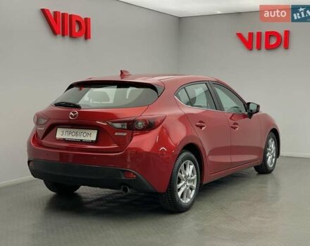 Красный Мазда 3, объемом двигателя 1.5 л и пробегом 143 тыс. км за 11986 $, фото 1 на Automoto.ua