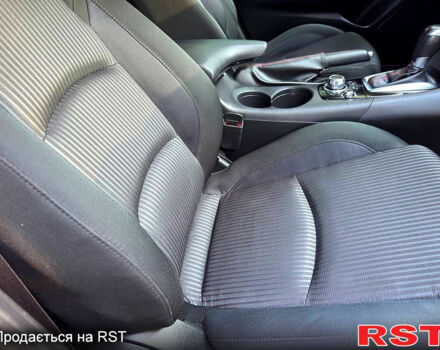 Красный Мазда 3, объемом двигателя 2 л и пробегом 143 тыс. км за 9350 $, фото 11 на Automoto.ua