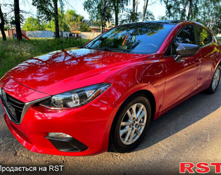 Красный Мазда 3, объемом двигателя 2 л и пробегом 143 тыс. км за 9350 $, фото 1 на Automoto.ua