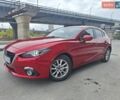 Красный Мазда 3, объемом двигателя 2 л и пробегом 147 тыс. км за 10499 $, фото 1 на Automoto.ua