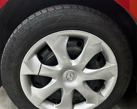 Красный Мазда 3, объемом двигателя 2 л и пробегом 150 тыс. км за 12000 $, фото 11 на Automoto.ua