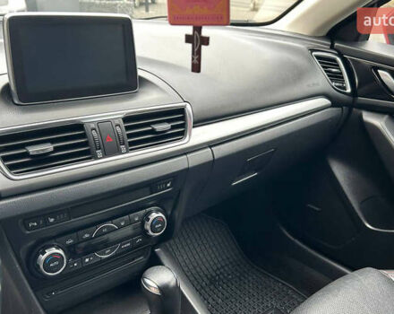 Красный Мазда 3, объемом двигателя 2.19 л и пробегом 142 тыс. км за 14000 $, фото 12 на Automoto.ua