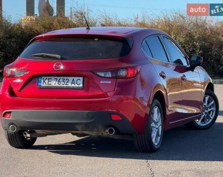 Красный Мазда 3, объемом двигателя 2 л и пробегом 130 тыс. км за 10999 $, фото 1 на Automoto.ua