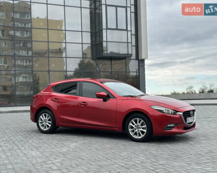 Красный Мазда 3, объемом двигателя 2 л и пробегом 56 тыс. км за 12500 $, фото 4 на Automoto.ua