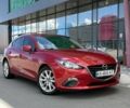 Красный Мазда 3, объемом двигателя 2 л и пробегом 142 тыс. км за 9800 $, фото 1 на Automoto.ua