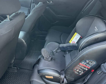 Красный Мазда 3, объемом двигателя 2 л и пробегом 122 тыс. км за 11700 $, фото 13 на Automoto.ua