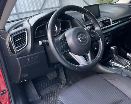Красный Мазда 3, объемом двигателя 2 л и пробегом 122 тыс. км за 11700 $, фото 2 на Automoto.ua