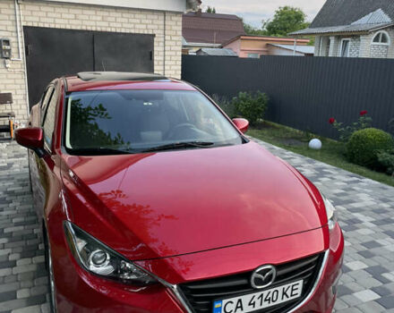 Красный Мазда 3, объемом двигателя 2 л и пробегом 122 тыс. км за 11700 $, фото 1 на Automoto.ua