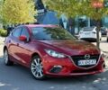Красный Мазда 3, объемом двигателя 2 л и пробегом 142 тыс. км за 9300 $, фото 1 на Automoto.ua