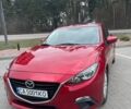 Красный Мазда 3, объемом двигателя 2 л и пробегом 132 тыс. км за 11100 $, фото 1 на Automoto.ua