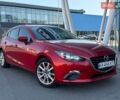 Красный Мазда 3, объемом двигателя 2 л и пробегом 142 тыс. км за 9990 $, фото 1 на Automoto.ua