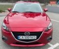 Красный Мазда 3, объемом двигателя 2 л и пробегом 128 тыс. км за 11300 $, фото 1 на Automoto.ua