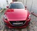 Красный Мазда 3, объемом двигателя 2 л и пробегом 59 тыс. км за 13783 $, фото 1 на Automoto.ua