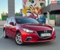 Красный Мазда 3, объемом двигателя 2 л и пробегом 142 тыс. км за 9750 $, фото 1 на Automoto.ua