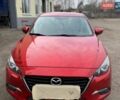 Красный Мазда 3, объемом двигателя 1.5 л и пробегом 153 тыс. км за 14000 $, фото 1 на Automoto.ua