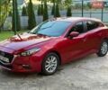 Красный Мазда 3, объемом двигателя 2 л и пробегом 161 тыс. км за 10600 $, фото 1 на Automoto.ua