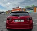 Красный Мазда 3, объемом двигателя 2 л и пробегом 162 тыс. км за 11099 $, фото 13 на Automoto.ua