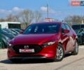 Красный Мазда 3, объемом двигателя 2 л и пробегом 60 тыс. км за 14900 $, фото 1 на Automoto.ua
