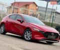 Красный Мазда 3, объемом двигателя 2.49 л и пробегом 96 тыс. км за 15500 $, фото 1 на Automoto.ua