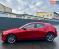 Красный Мазда 3, объемом двигателя 2.49 л и пробегом 73 тыс. км за 17500 $, фото 1 на Automoto.ua