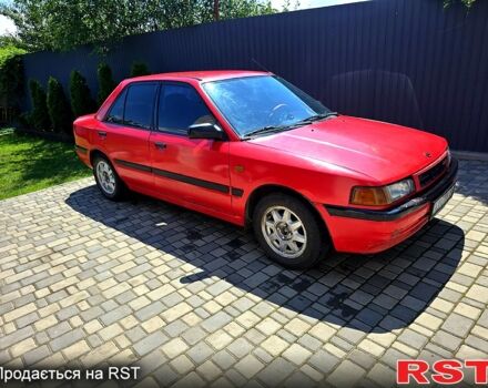 Красный Мазда 3, объемом двигателя 1.6 л и пробегом 240 тыс. км за 1450 $, фото 1 на Automoto.ua