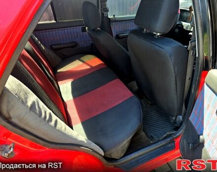 Красный Мазда 3, объемом двигателя 1.6 л и пробегом 240 тыс. км за 1450 $, фото 2 на Automoto.ua