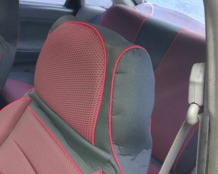 Красный Мазда 3, объемом двигателя 1.8 л и пробегом 320 тыс. км за 1700 $, фото 8 на Automoto.ua