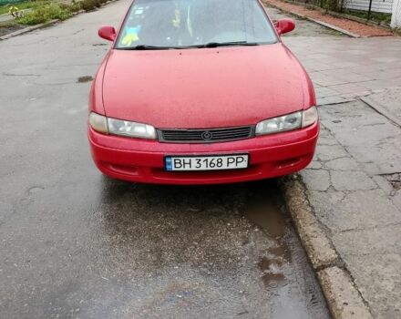 Красный Мазда 3, объемом двигателя 1.8 л и пробегом 320 тыс. км за 1700 $, фото 2 на Automoto.ua