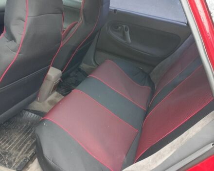 Красный Мазда 3, объемом двигателя 1.8 л и пробегом 320 тыс. км за 1700 $, фото 5 на Automoto.ua