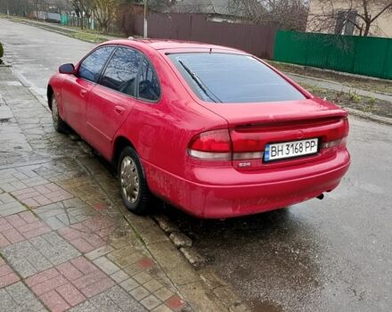 Красный Мазда 3, объемом двигателя 1.8 л и пробегом 320 тыс. км за 1700 $, фото 4 на Automoto.ua