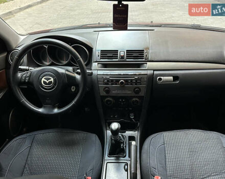 Красный Мазда 3, объемом двигателя 2 л и пробегом 250 тыс. км за 3650 $, фото 8 на Automoto.ua