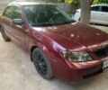 Красный Мазда 3, объемом двигателя 2 л и пробегом 170 тыс. км за 1720 $, фото 1 на Automoto.ua
