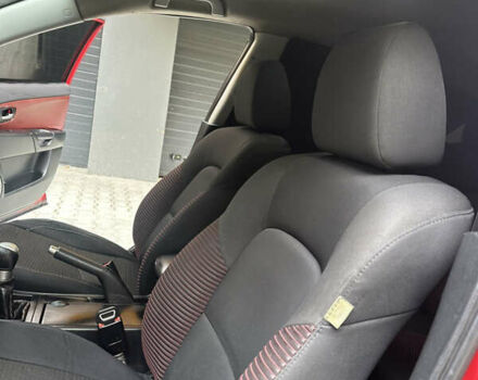 Красный Мазда 3, объемом двигателя 2 л и пробегом 250 тыс. км за 3650 $, фото 12 на Automoto.ua