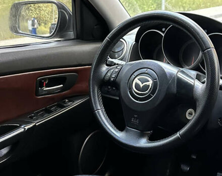 Красный Мазда 3, объемом двигателя 2 л и пробегом 250 тыс. км за 3650 $, фото 3 на Automoto.ua