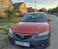 Червоний Мазда 3, об'ємом двигуна 1.6 л та пробігом 288 тис. км за 2398 $, фото 1 на Automoto.ua