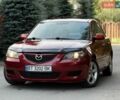 Червоний Мазда 3, об'ємом двигуна 2 л та пробігом 250 тис. км за 3900 $, фото 1 на Automoto.ua