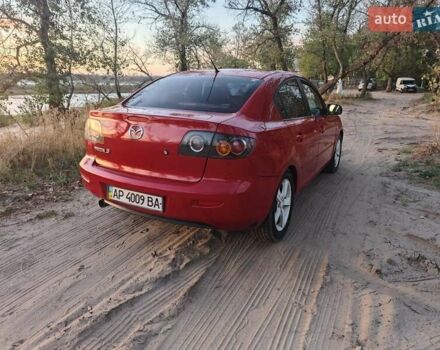 Красный Мазда 3, объемом двигателя 2 л и пробегом 286 тыс. км за 5000 $, фото 8 на Automoto.ua