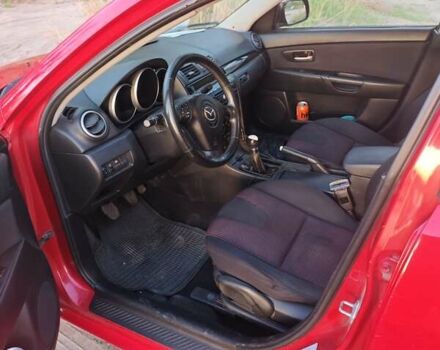 Красный Мазда 3, объемом двигателя 2 л и пробегом 286 тыс. км за 5000 $, фото 4 на Automoto.ua