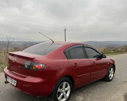 Красный Мазда 3, объемом двигателя 1.6 л и пробегом 288 тыс. км за 4500 $, фото 4 на Automoto.ua