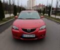 Красный Мазда 3, объемом двигателя 1.6 л и пробегом 280 тыс. км за 4299 $, фото 1 на Automoto.ua