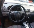 Красный Мазда 3, объемом двигателя 1.6 л и пробегом 410 тыс. км за 4500 $, фото 4 на Automoto.ua