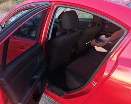 Красный Мазда 3, объемом двигателя 2 л и пробегом 286 тыс. км за 5000 $, фото 3 на Automoto.ua