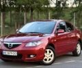 Красный Мазда 3, объемом двигателя 1.6 л и пробегом 203 тыс. км за 5100 $, фото 1 на Automoto.ua