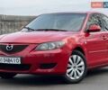 Красный Мазда 3, объемом двигателя 1.6 л и пробегом 266 тыс. км за 4800 $, фото 1 на Automoto.ua