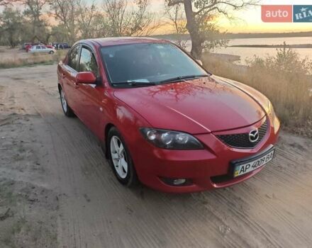 Красный Мазда 3, объемом двигателя 2 л и пробегом 286 тыс. км за 5000 $, фото 9 на Automoto.ua