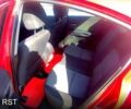 Красный Мазда 3, объемом двигателя 2 л и пробегом 109 тыс. км за 4400 $, фото 3 на Automoto.ua
