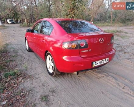 Красный Мазда 3, объемом двигателя 2 л и пробегом 286 тыс. км за 5000 $, фото 7 на Automoto.ua
